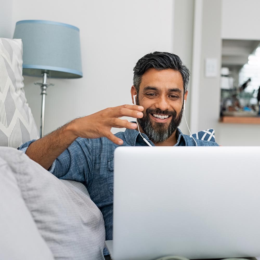 Man using laptop for video call